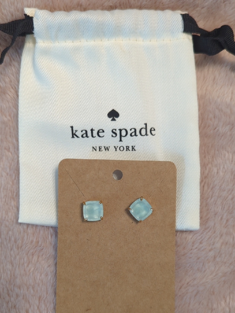 Kate Spade pale blue cushion stud earrings with gold prongs